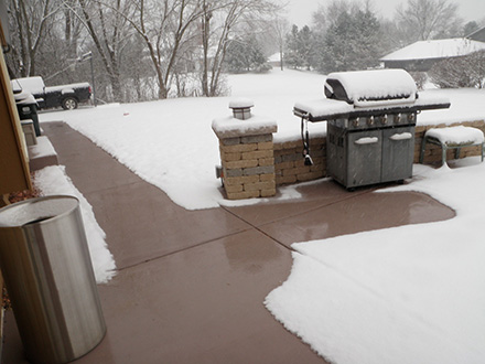 Snow melting system installed to heat sidewalks and patio.