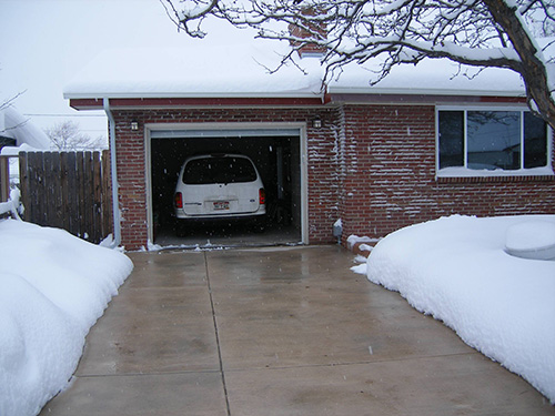 A residential heated driveway after a snowstorm.